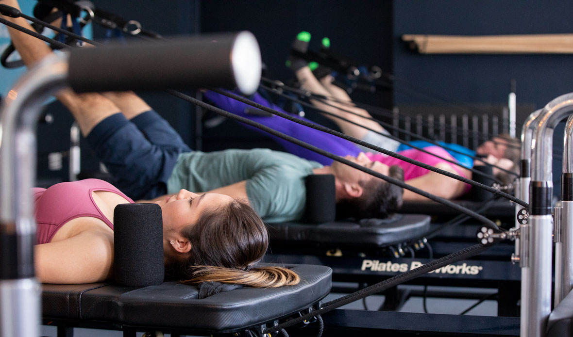 Commercial Photography People doing Pilates-on Machines in Old Town Alexandria Virginia | Pamela Kay Photography